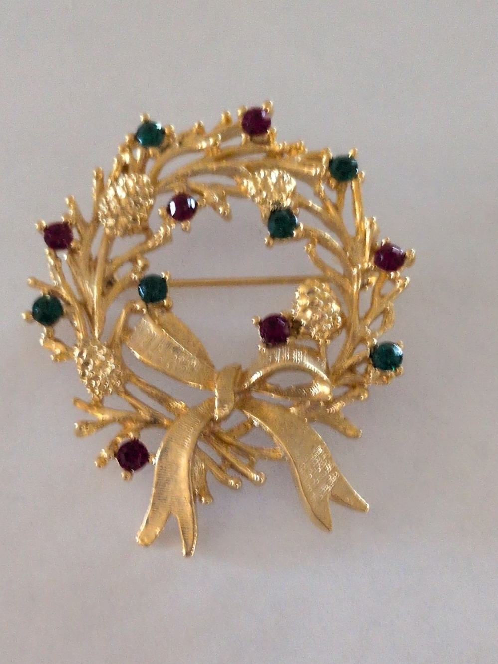 Gold-Tone Wreath Brooch with Green and Red Stones